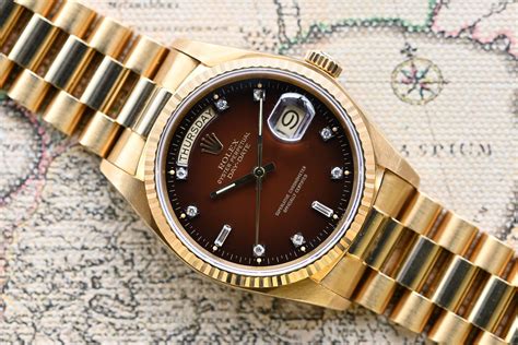 rolex day date brown dial.